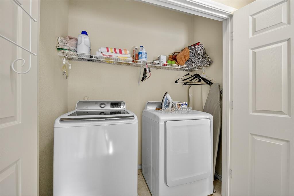 2004 Azure Pointe Richardson, TX 75080 - Photo 12 of 23 a utility room with dryer and washer