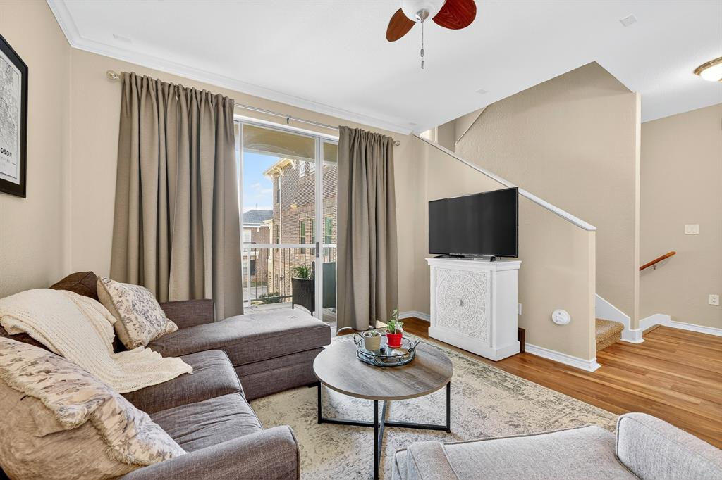 2004 Azure Pointe Richardson, TX 75080 - Photo 6 of 23 a living room with furniture and a flat screen tv
