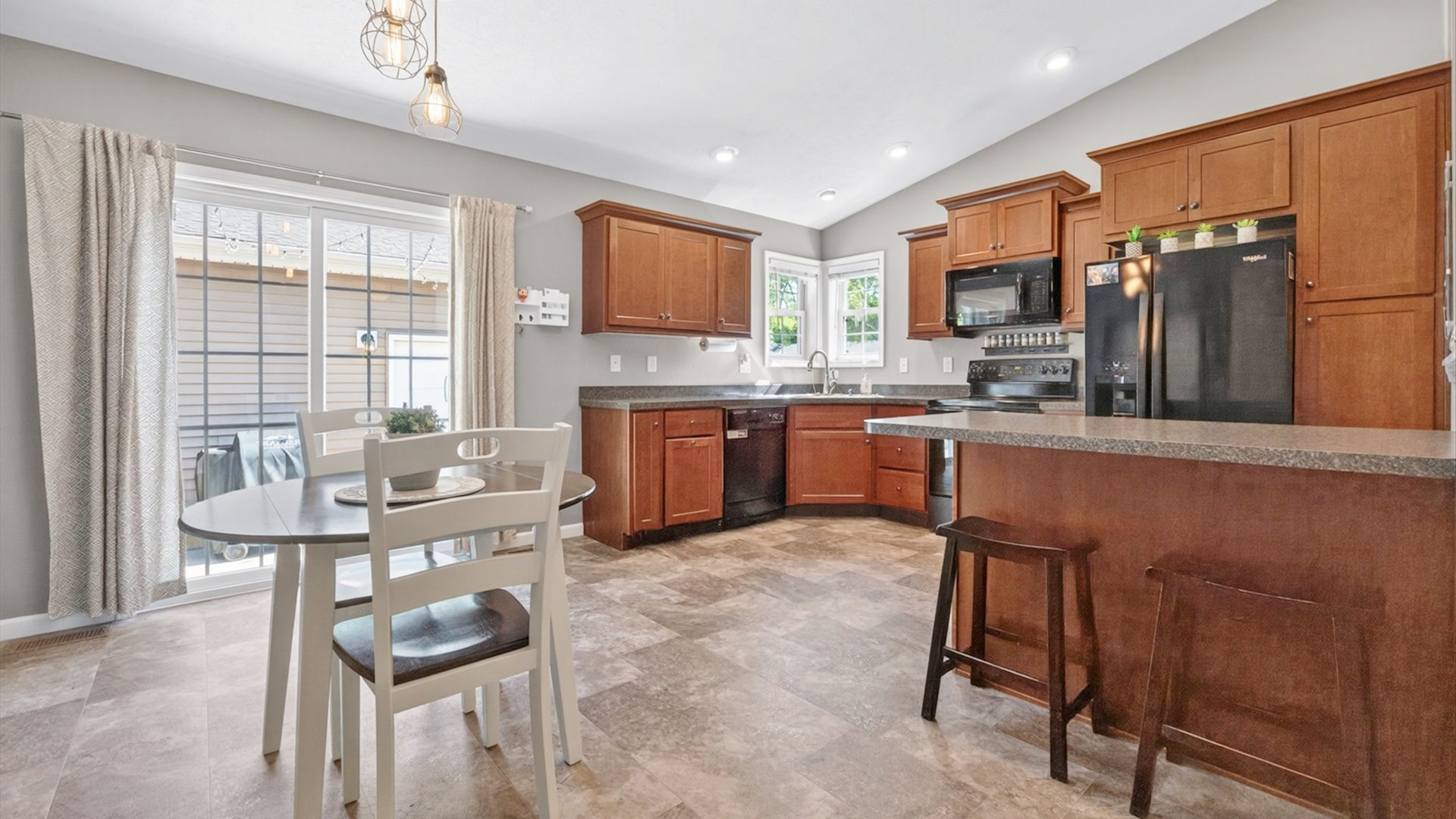 308 East Locust Street Normal, IL 61761 - Photo 8 of 40 a kitchen with a sink cabinets and window