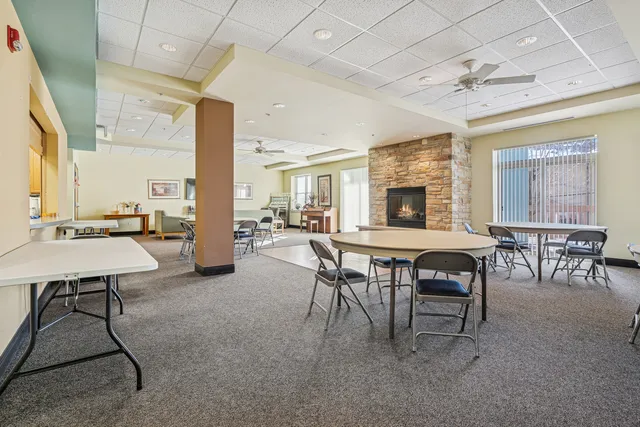a view of a backyard with sitting area
