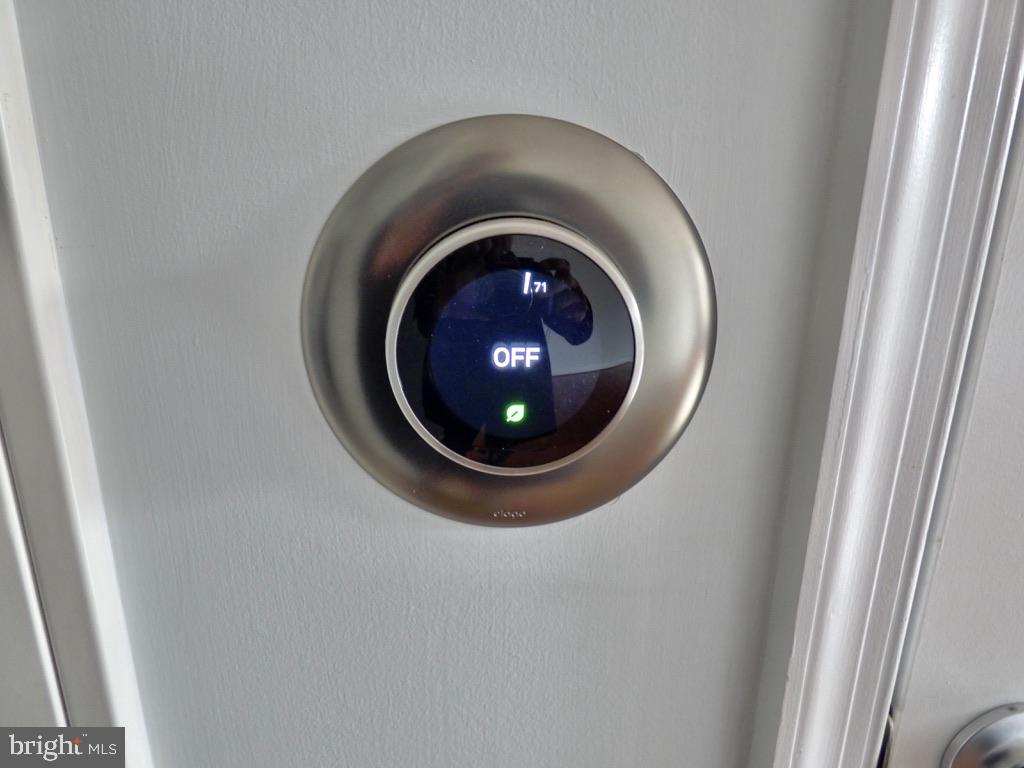 11800 Sunset Hills Road, Unit 118 Reston, VA 20190 - Photo 27 of 52 Smart thermostat displaying OFF mode.