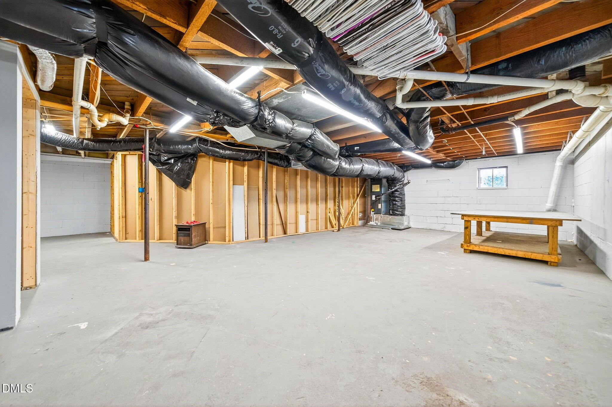 144 Pearidge Road Willow Spring, NC 27592 - Photo 13 of 26 a view of a room with wooden walls