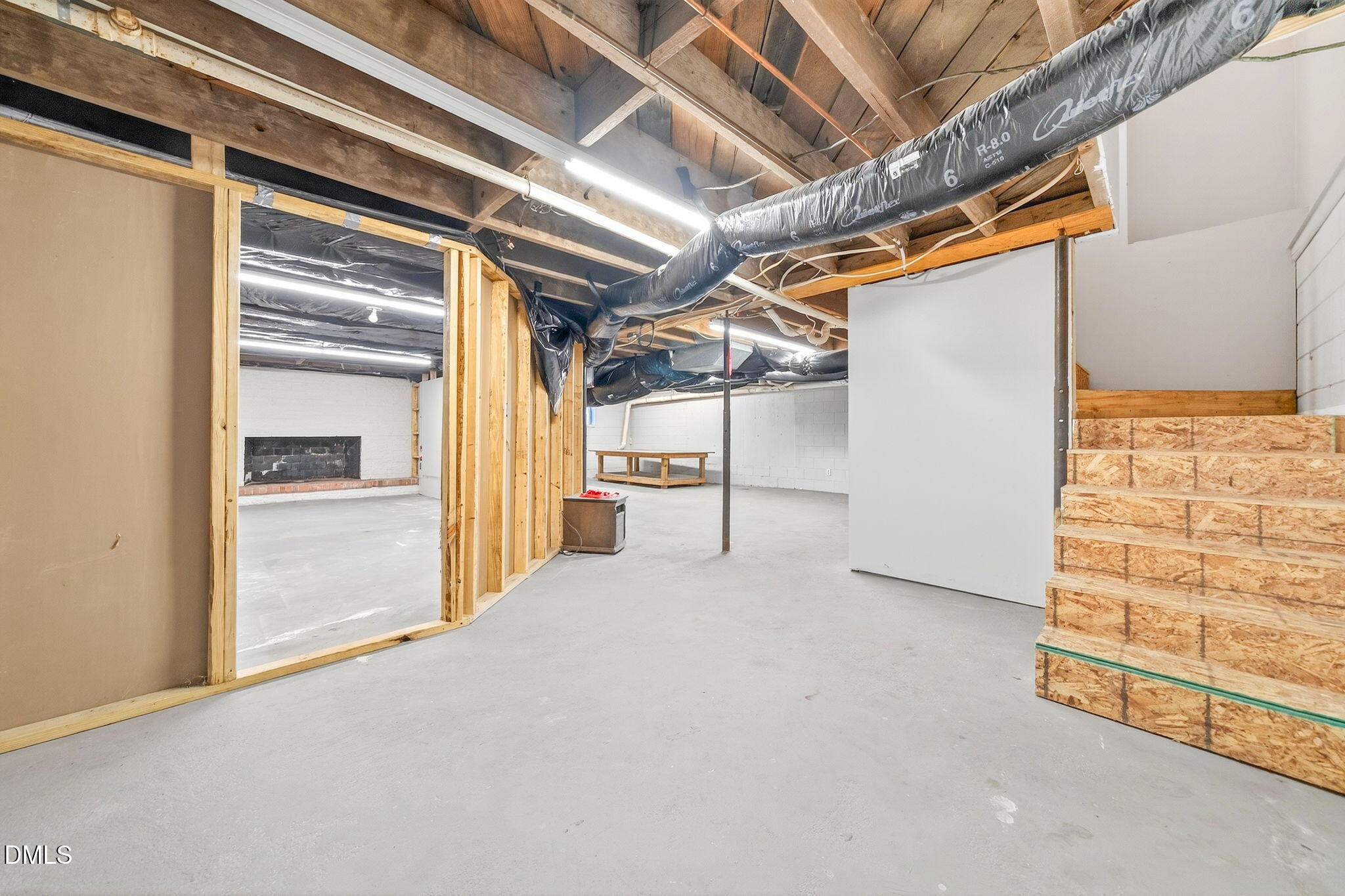 144 Pearidge Road Willow Spring, NC 27592 - Photo 14 of 26 a view of empty room with wooden walls