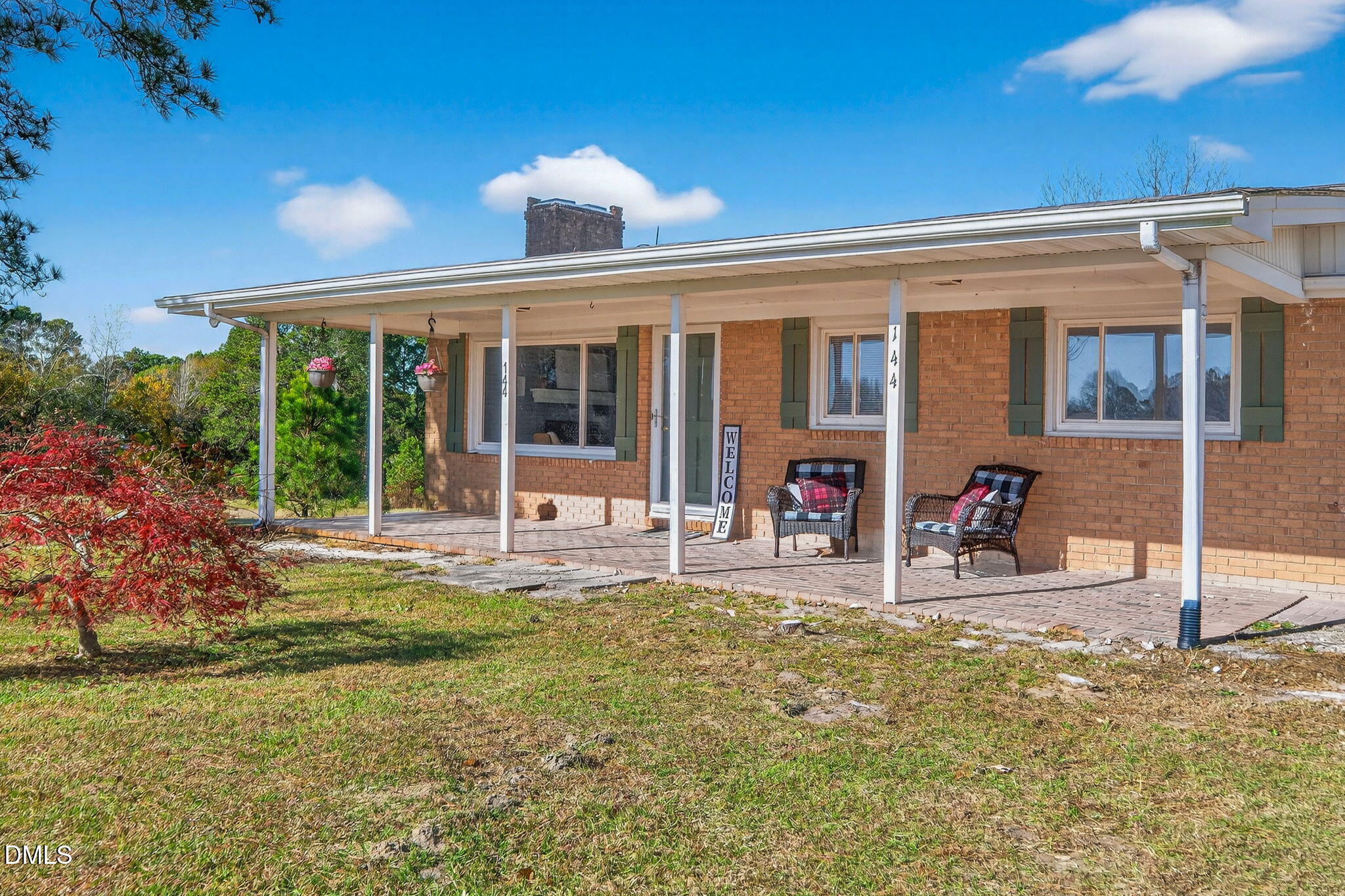 144 Pearidge Road Willow Spring, NC 27592 - Photo 2 of 26 front view of a house with a large window