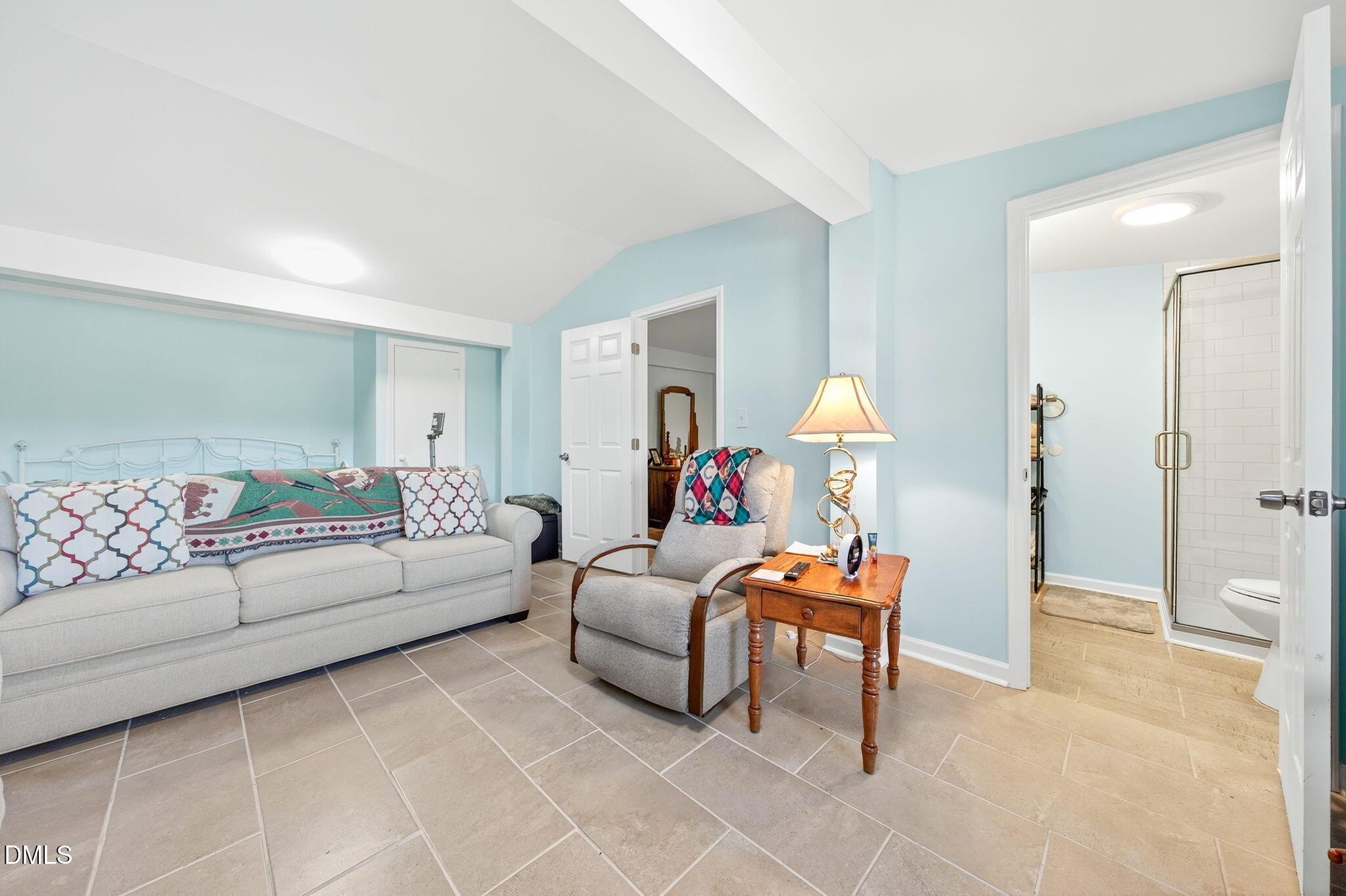 144 Pearidge Road Willow Spring, NC 27592 - Photo 21 of 26 a living room with furniture and a lamp
