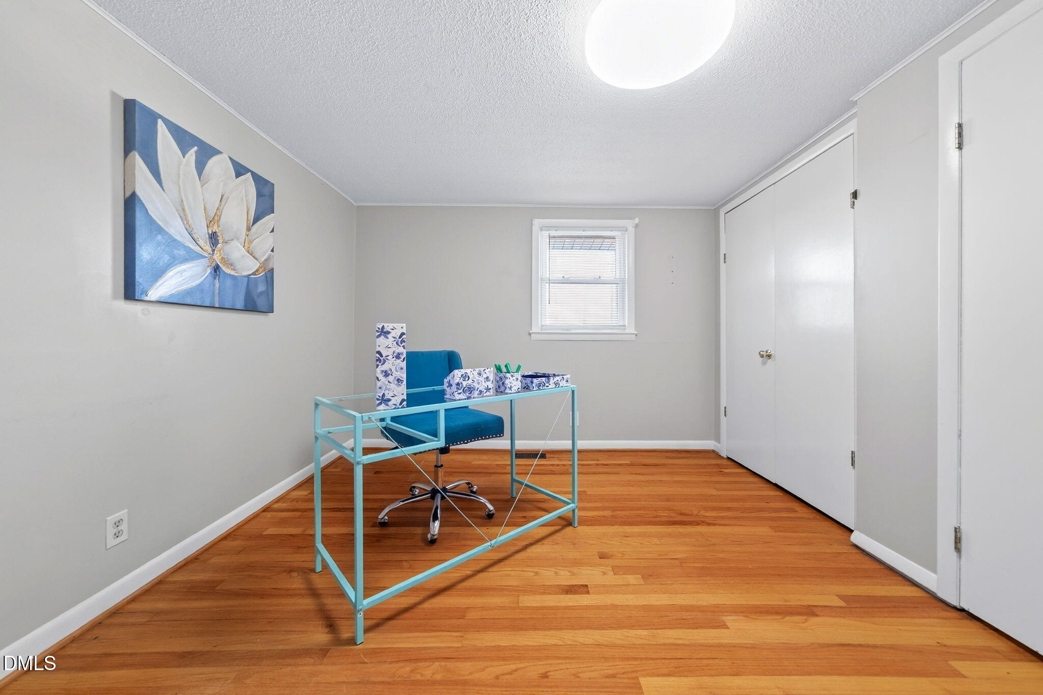144 Pearidge Road Willow Spring, NC 27592 - Photo 10 of 26 a room with furniture and wooden floor
