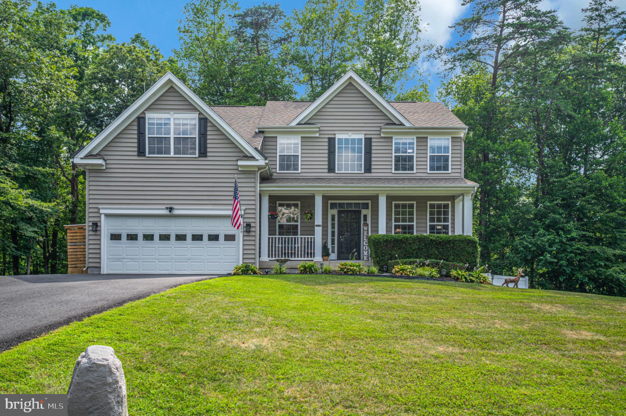 239 Toluca Road Stafford, VA 22556 - Photo 14 of 75 Charming home nestled in lush greenery.