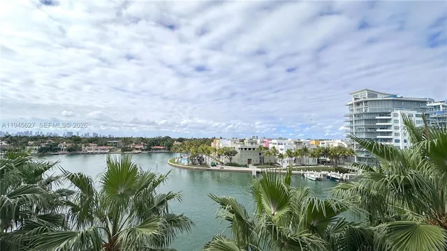 a view of a lake with a city