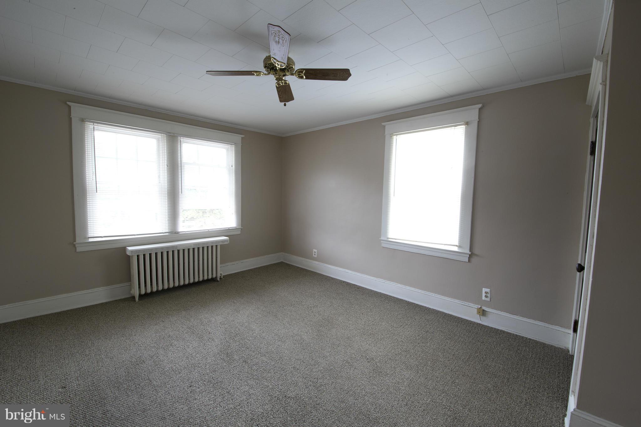 4502 Ridge Avenue Halethorpe, MD 21227 - Photo 10 of 24 an empty room with windows