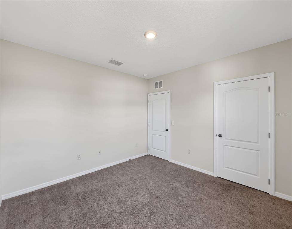 2597 Shamrock Street Tavares, FL 32778 - Photo 23 of 57 a view of an empty room