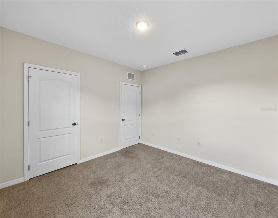 2597 Shamrock Street Tavares, FL 32778 - Photo 28 of 57 a view of an empty room