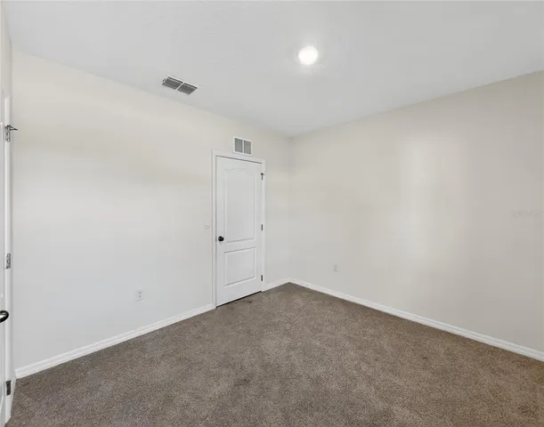 a bathroom with a tub and shower