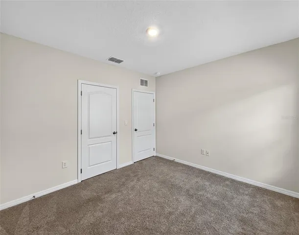 an aerial view of residential house with outdoor space and lake view