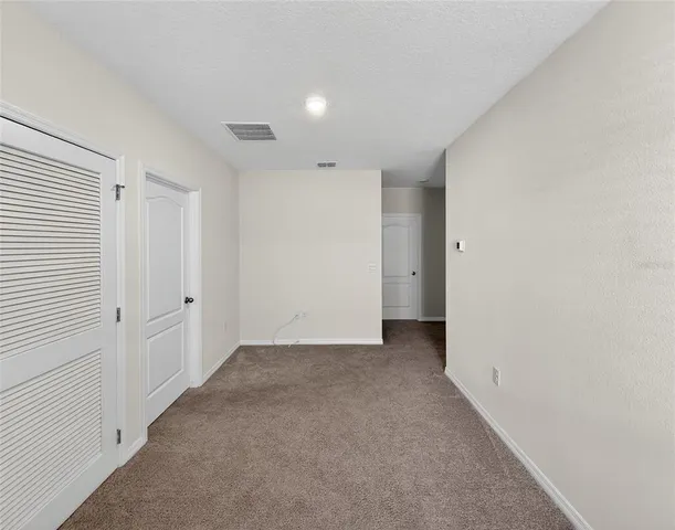 a view of a lake with a city