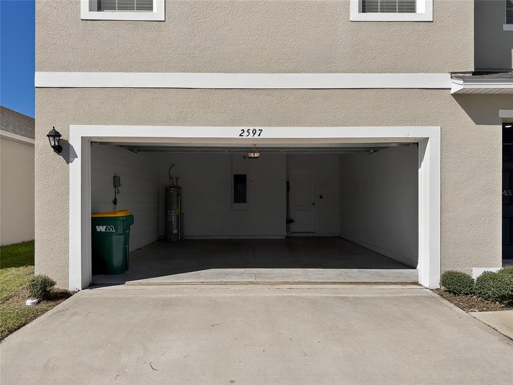 2597 Shamrock Street Tavares, FL 32778 - Photo 48 of 57 a kitchen with a sink and cabinets