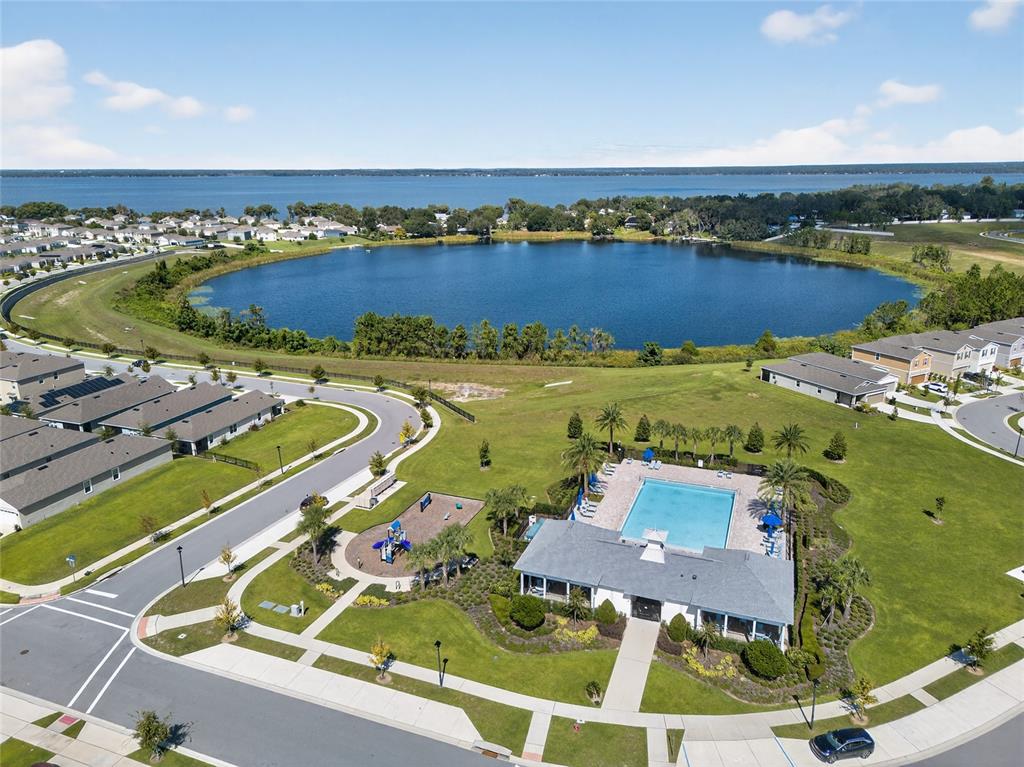 2597 Shamrock Street Tavares, FL 32778 - Photo 52 of 57 an aerial view of a house with a lake view