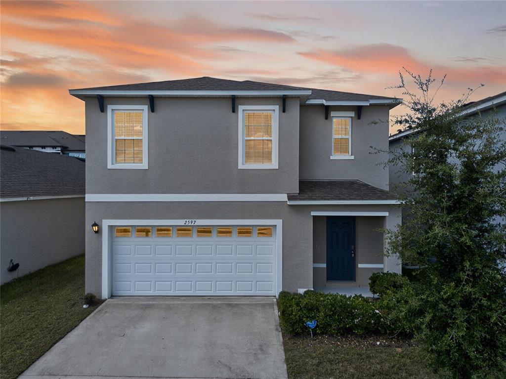2597 Shamrock Street Tavares, FL 32778 - Photo 55 of 57 front view of house with an window