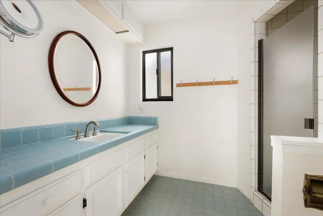 a view of room with window and ceiling fan