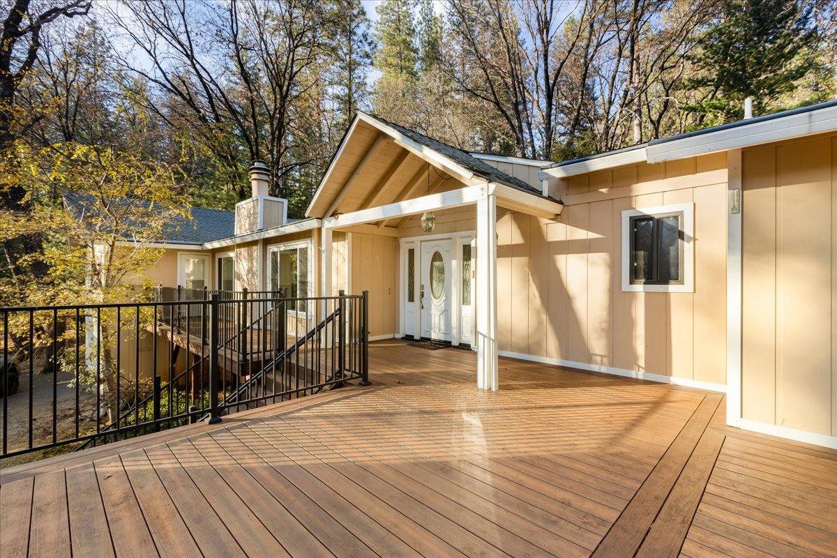 15212 Stinson Drive Grass Valley, CA 95949 - Photo 2 of 30 a view of a house with wooden deck
