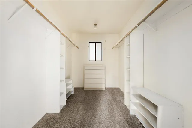 a bathroom with a sink toilet and mirror