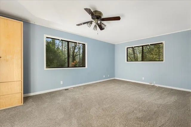 a house with trees in front of it