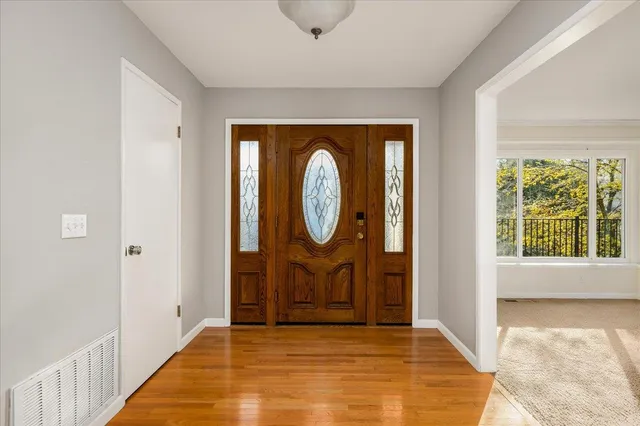 a view of a livingroom with furniture and window