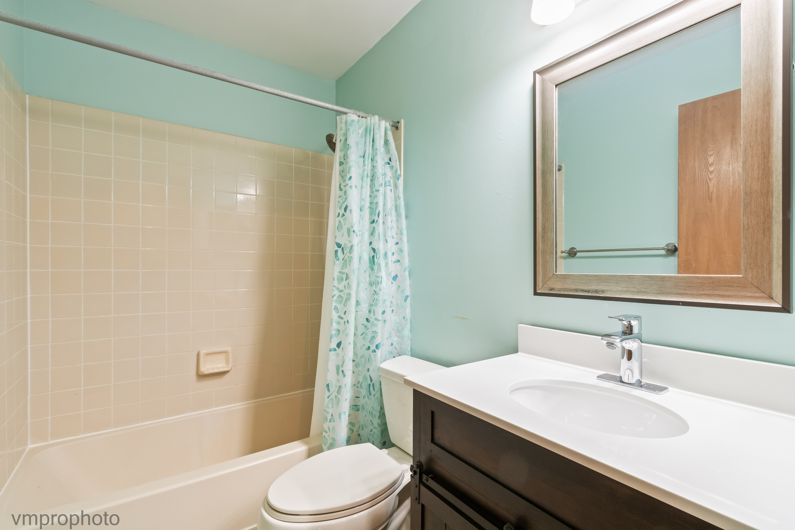 4549 Topaz Drive Hoffman Estates, IL 60192 - Photo 13 of 20 a bathroom with a sink a toilet and shower