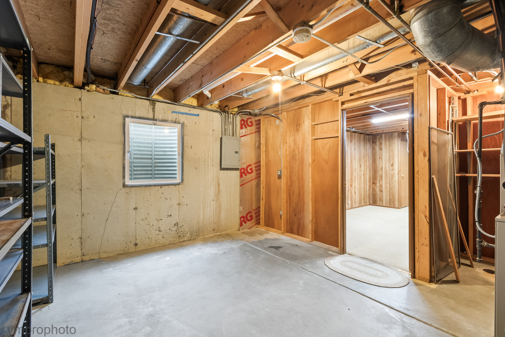 4549 Topaz Drive Hoffman Estates, IL 60192 - Photo 15 of 20 a view of a hallway with wooden walls