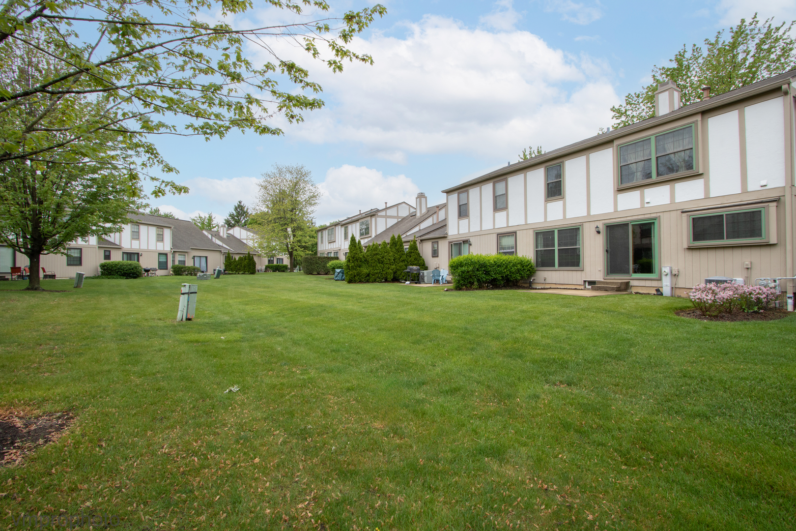 4549 Topaz Drive Hoffman Estates, IL 60192 - Photo 17 of 20 a view of a house with a big yard