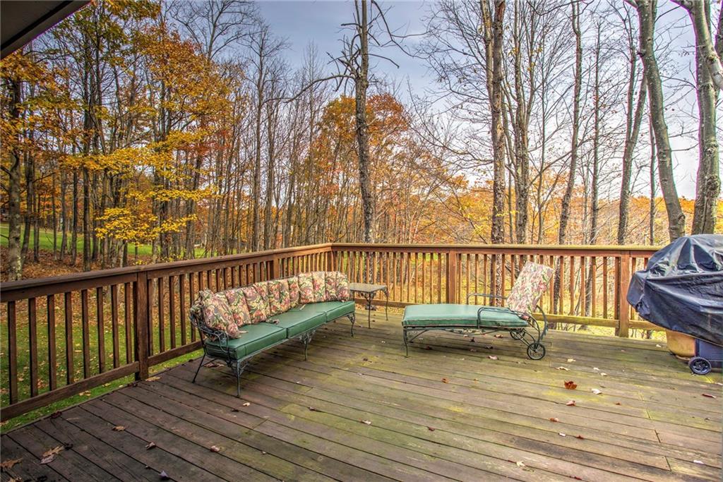 1945 South Ridge Way Hidden Valley, PA 15502 - Photo 14 of 22 Huge deck off the dining room! Beyond those trees is the 16 Fairway.. What a beautiful view!