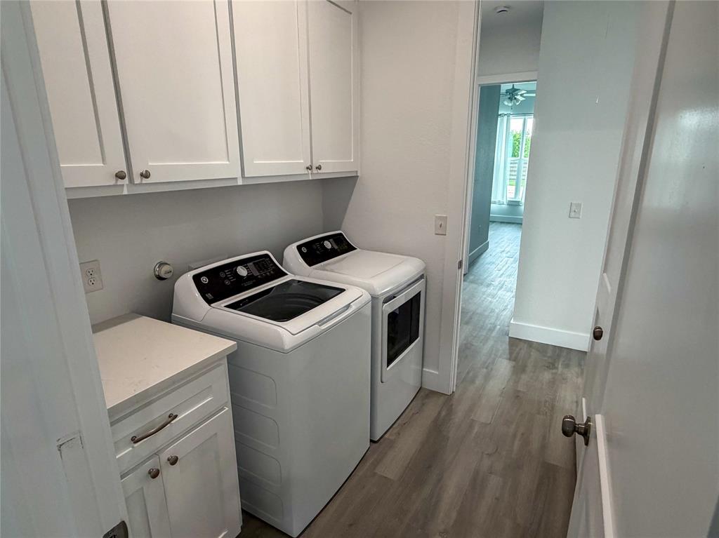 4200 Williams Road Bellmead, TX 76705 - Photo 20 of 22 a utility room with sink dryer and washer