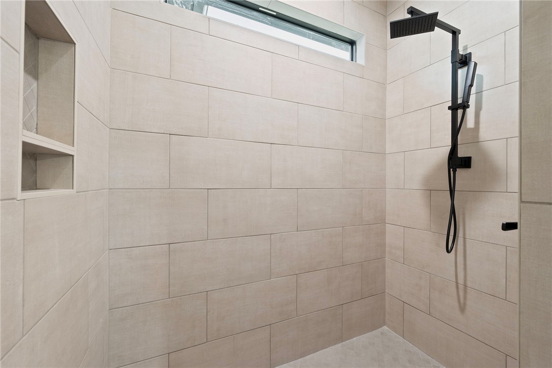 4602 Wesson Drive Bryan, TX 77808 - Photo 27 of 50 Large walk-in shower with rainhead and handheld spray