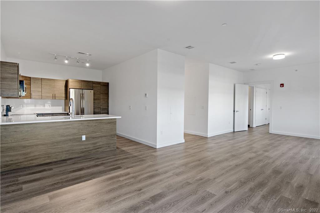 Unit #202 is 1 bed/1.5 bath with open concept living & European style kitchen
