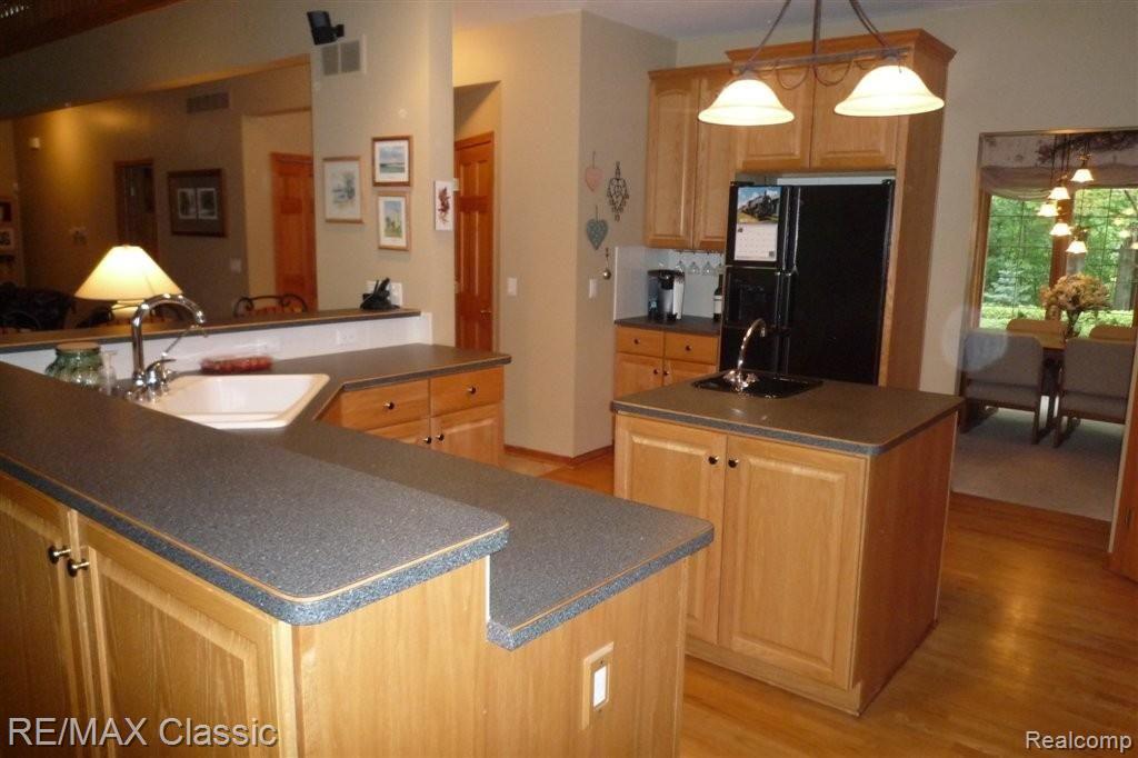 9418 Quail Ridge Run Brighton, MI 48114 - Photo 10 of 20 A Different Perspective