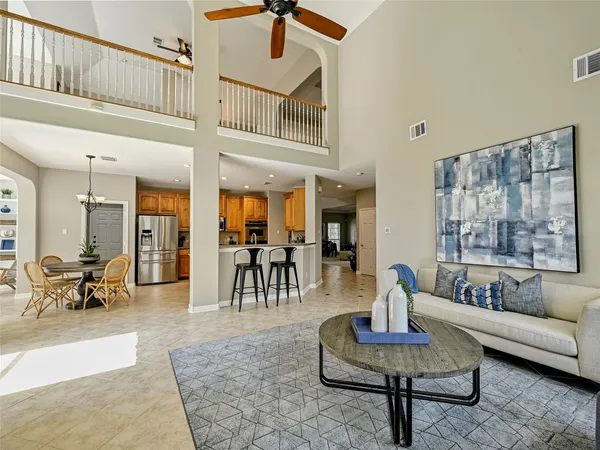 a living room with furniture and a table