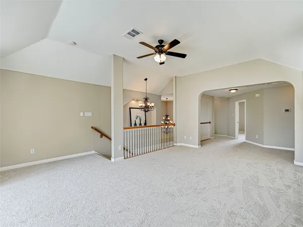 a view of a livingroom with a ceiling fan