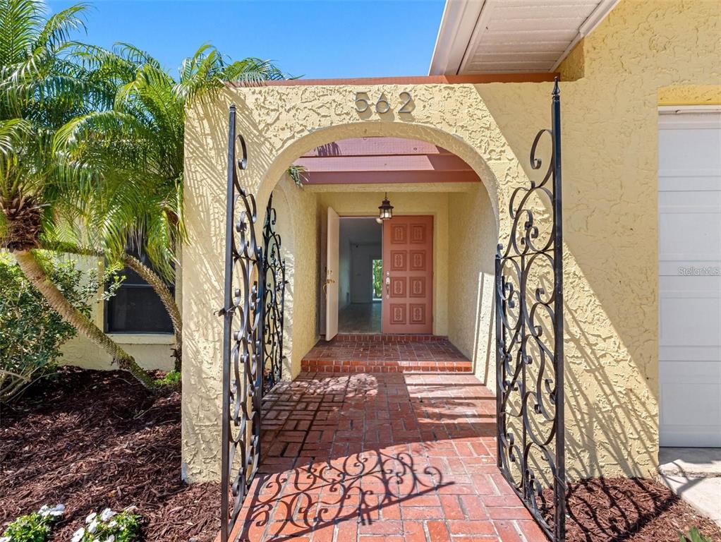 562 Johns Pass Avenue Madeira Beach, FL 33708 - Photo 11 of 51 a view of a door of the house