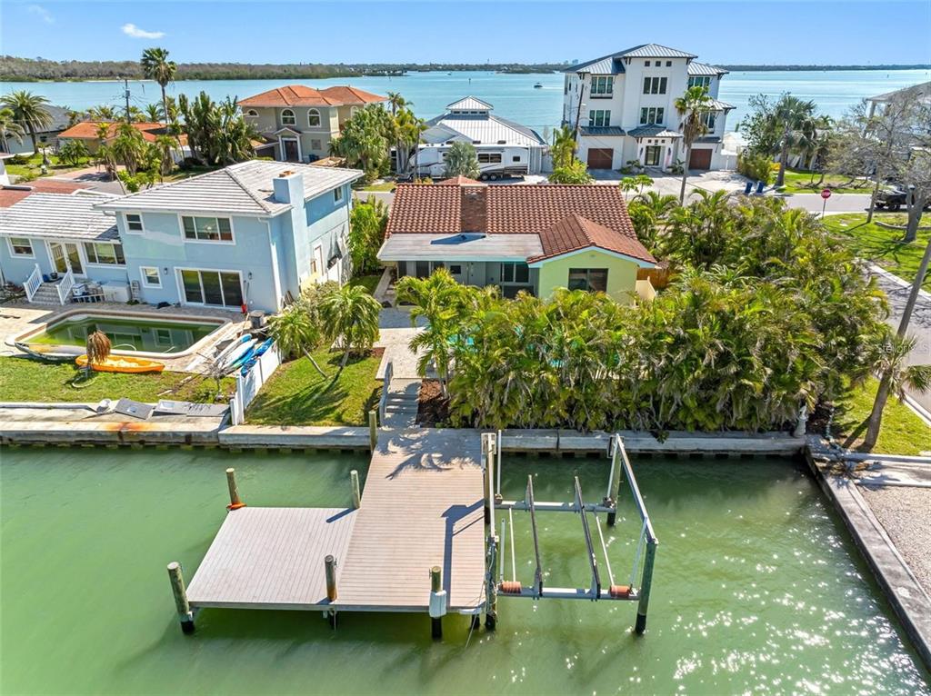 562 Johns Pass Avenue Madeira Beach, FL 33708 - Photo 3 of 51 an aerial view of a house with a garden space