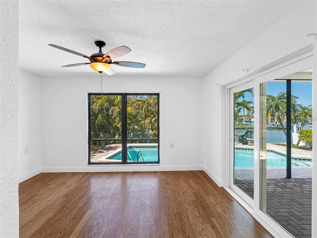 562 Johns Pass Avenue Madeira Beach, FL 33708 - Photo 32 of 51 a view of an entryway with wooden floor