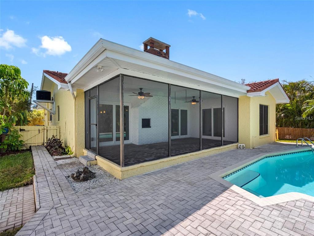 562 Johns Pass Avenue Madeira Beach, FL 33708 - Photo 41 of 51 a view of a house with backyard and porch