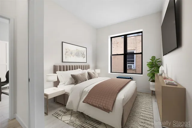 a bed room with a bed and a couch