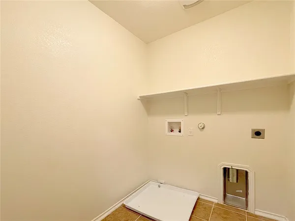 a bathroom with a shower sink vanity mirror and toilet