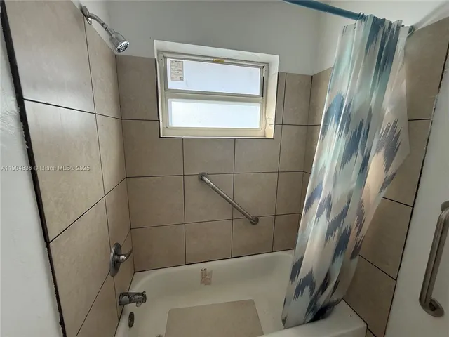 a bathroom with a bathtub