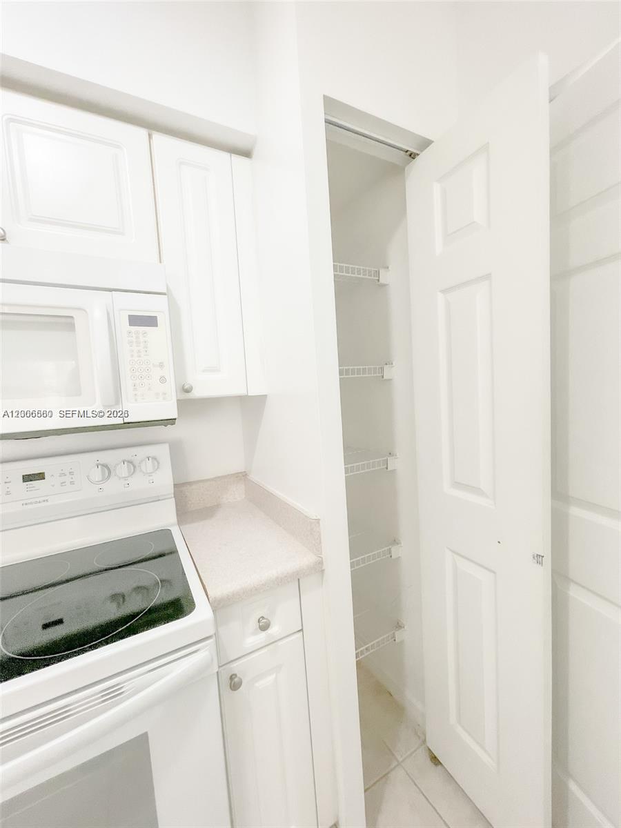 17150 North Bay Road, Unit 2602 Sunny Isles Beach, FL 33160 - Photo 12 of 27 a bathroom with a sink and a mirror