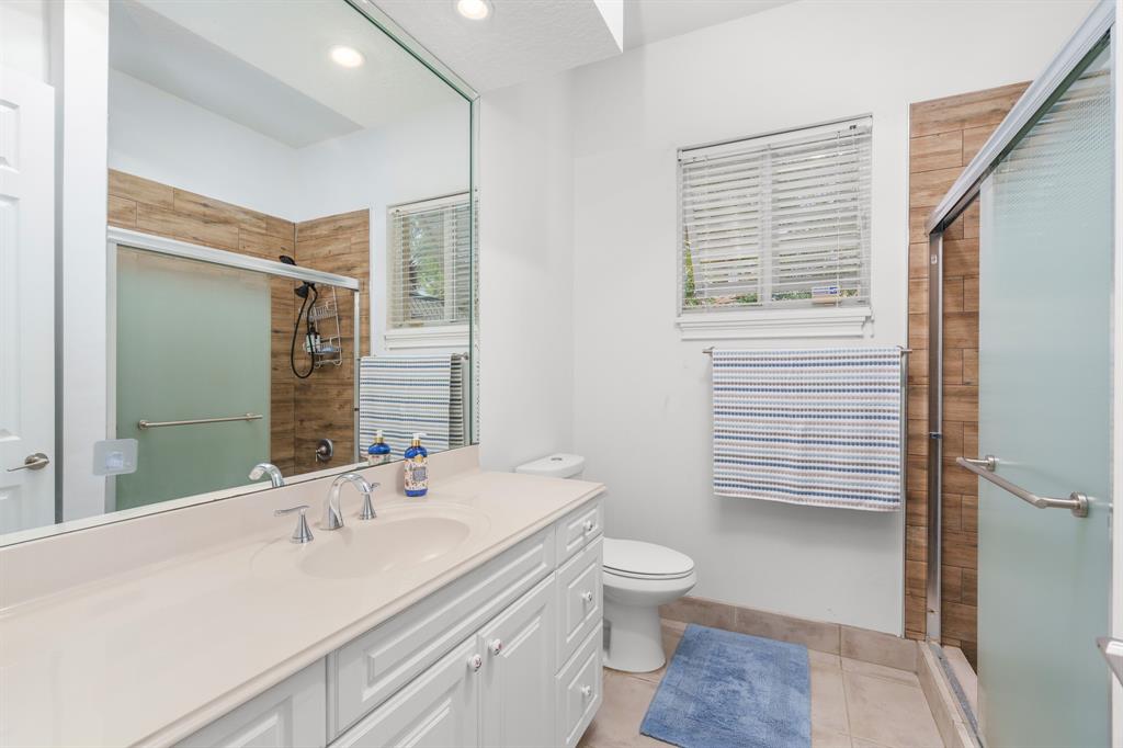 5973 Southwest 54th Court Davie, FL 33314 - Photo 26 of 49 a bathroom with a sink toilet and shower