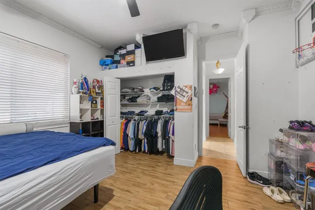 a view of a livingroom with furniture and a flat screen tv