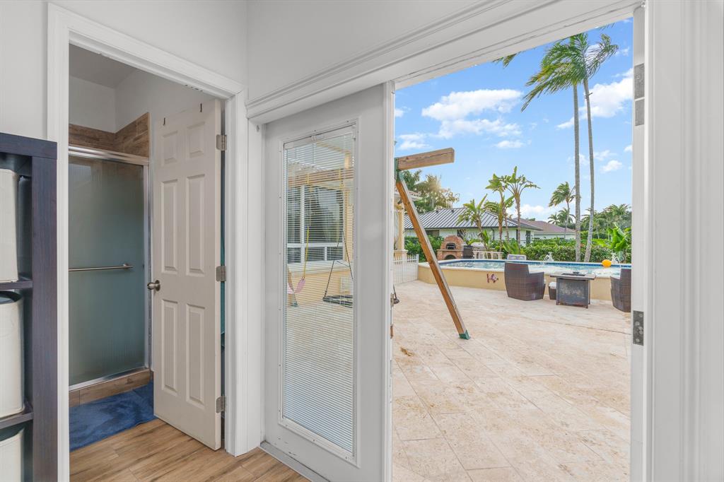 5973 Southwest 54th Court Davie, FL 33314 - Photo 32 of 49 a view of a hallway with wooden floor and a living room