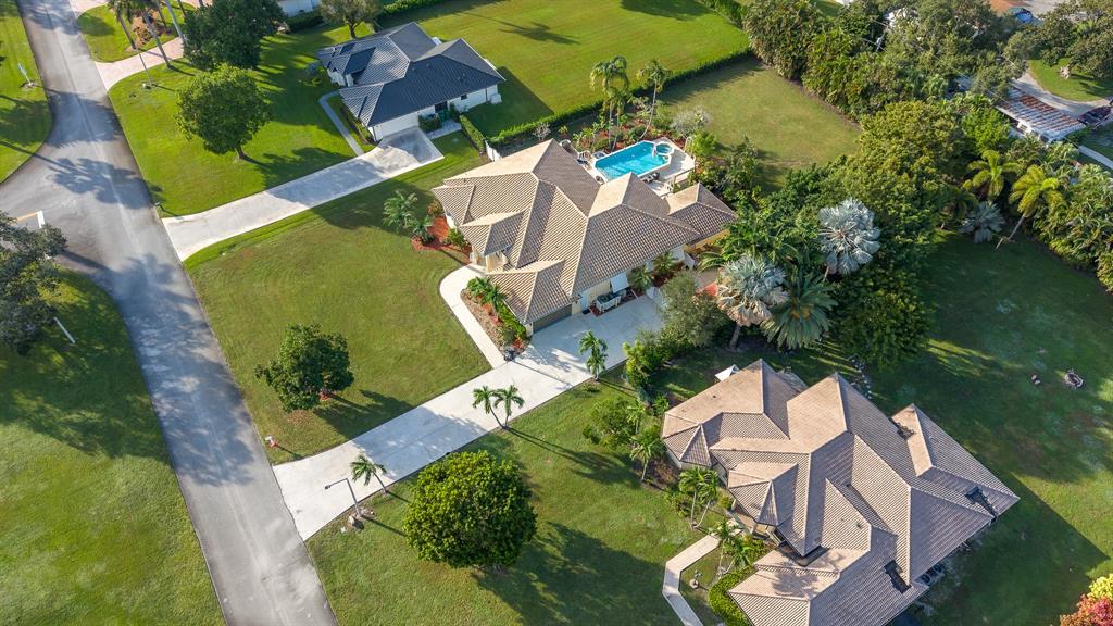 5973 Southwest 54th Court Davie, FL 33314 - Photo 41 of 49 an aerial view of a house with outdoor space and a lake view