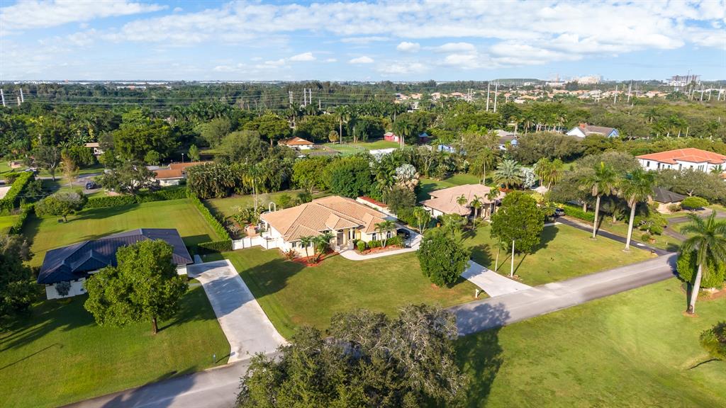 5973 Southwest 54th Court Davie, FL 33314 - Photo 43 of 49 an aerial view of residential houses with outdoor space
