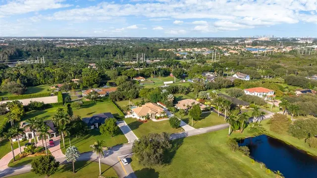 a view of a house with outdoor space and sitting area
